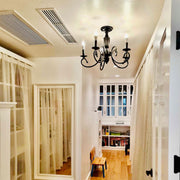 Creative Retro Candle Chandelier Black Metal Bedroom — view 3